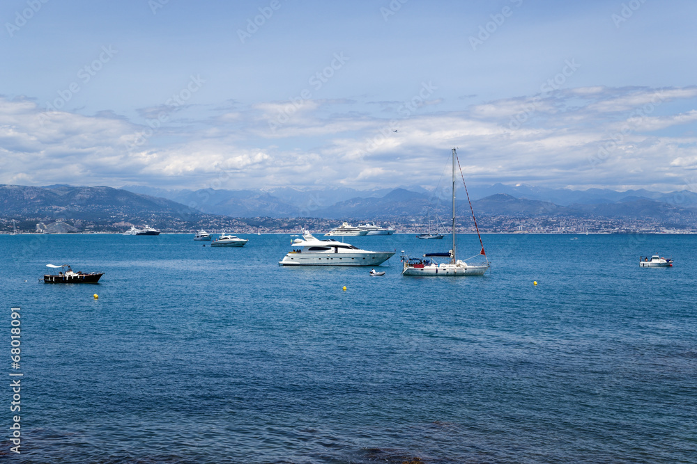 Antibes, France. Yacht on a background of mountains