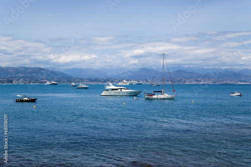 Antibes, France. Yacht on a background of mountains