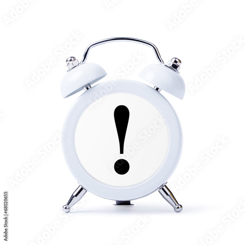 exclamation point in center of alarm clock