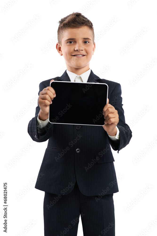 boy in black suit showing tablet computer boy in black suit showing tablet computer