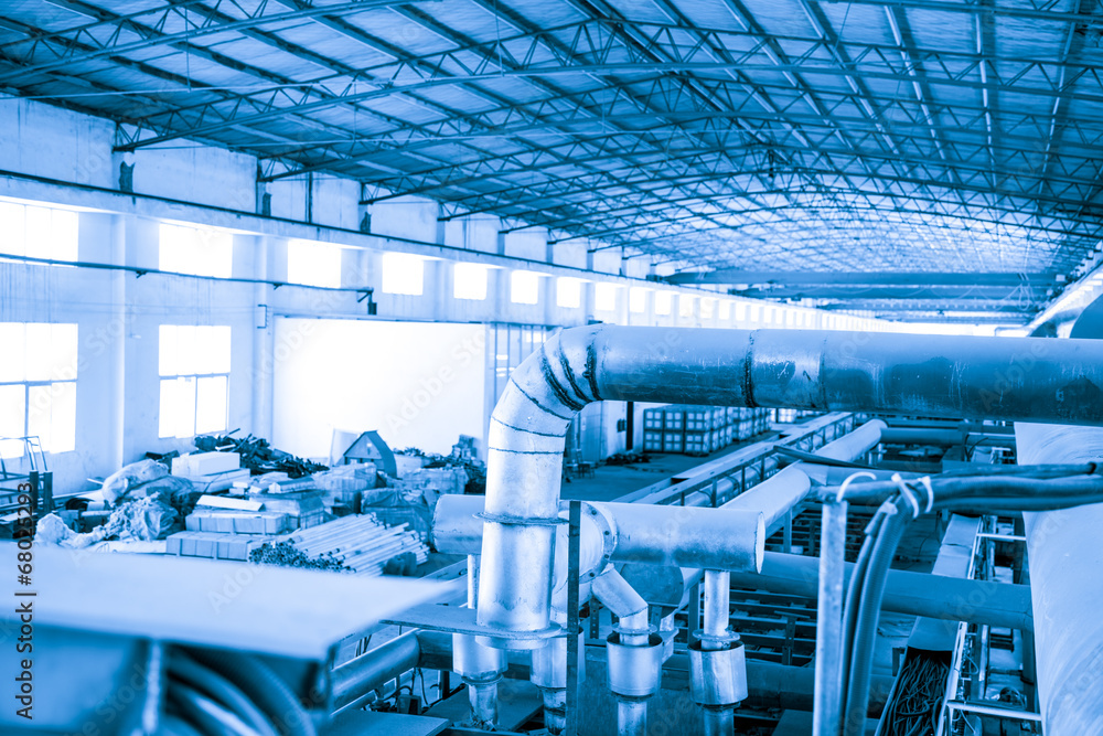 Naklejka premium Equipment, cables and piping as found inside