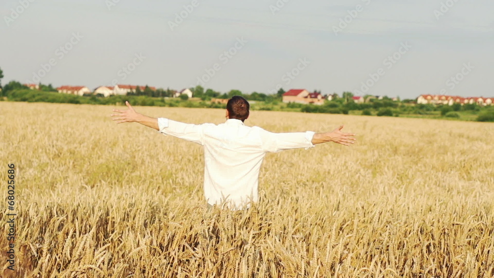 Happy man running in wheat field, super slow motion, 240fps Happy man running in wheat field, super slow motion, 240fps