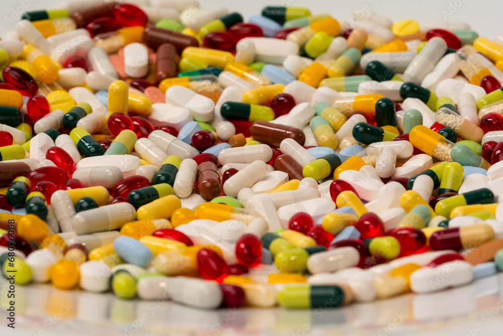 various pills and capsules as background various pills and capsules as background