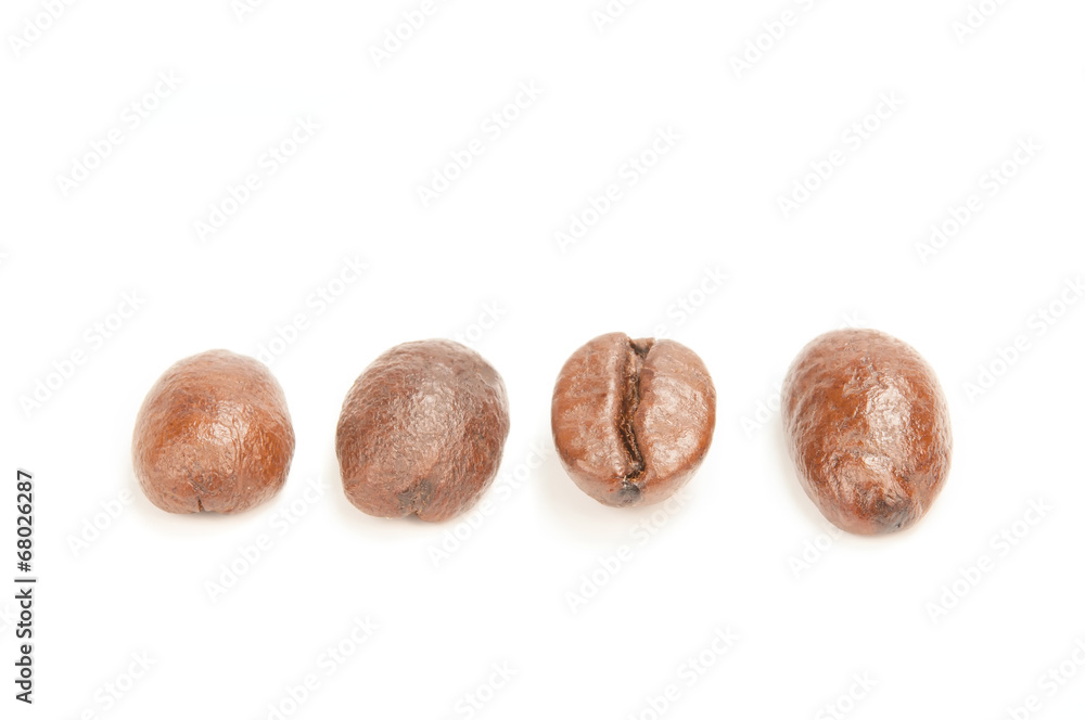 roasted coffee beans isolated on white background. roasted coffee beans isolated on white background.