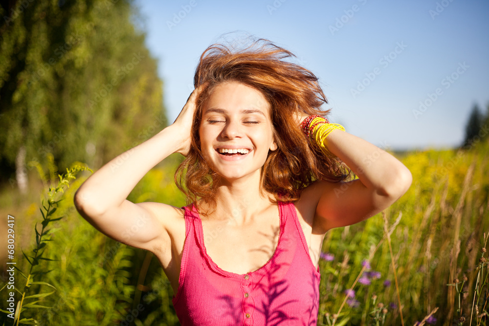 portrait of young beautiful happy woman with flying hair portrait of young beautiful happy woman with flying hair