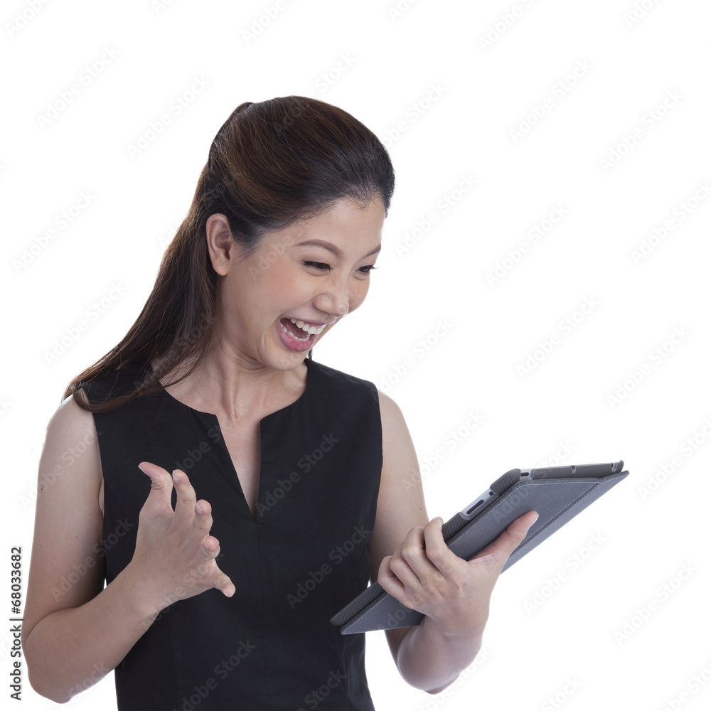 Tablet computer woman winning happy excited Tablet computer woman winning happy excited