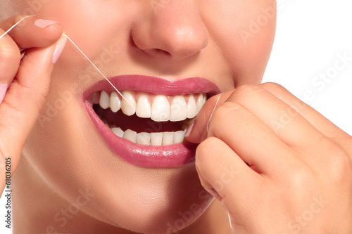 Fototapeta Naklejka Na Ścianę i Meble -  Closeup of smiling woman with perfect white teeth