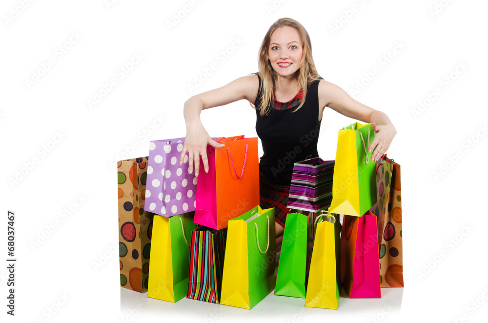 Young woman after shopping isolated on the white Young woman after shopping isolated on the white