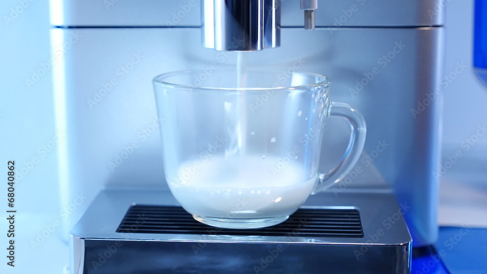 Coffee Machine prepares coffee in a glass cup Coffee Machine prepares coffee in a glass cup