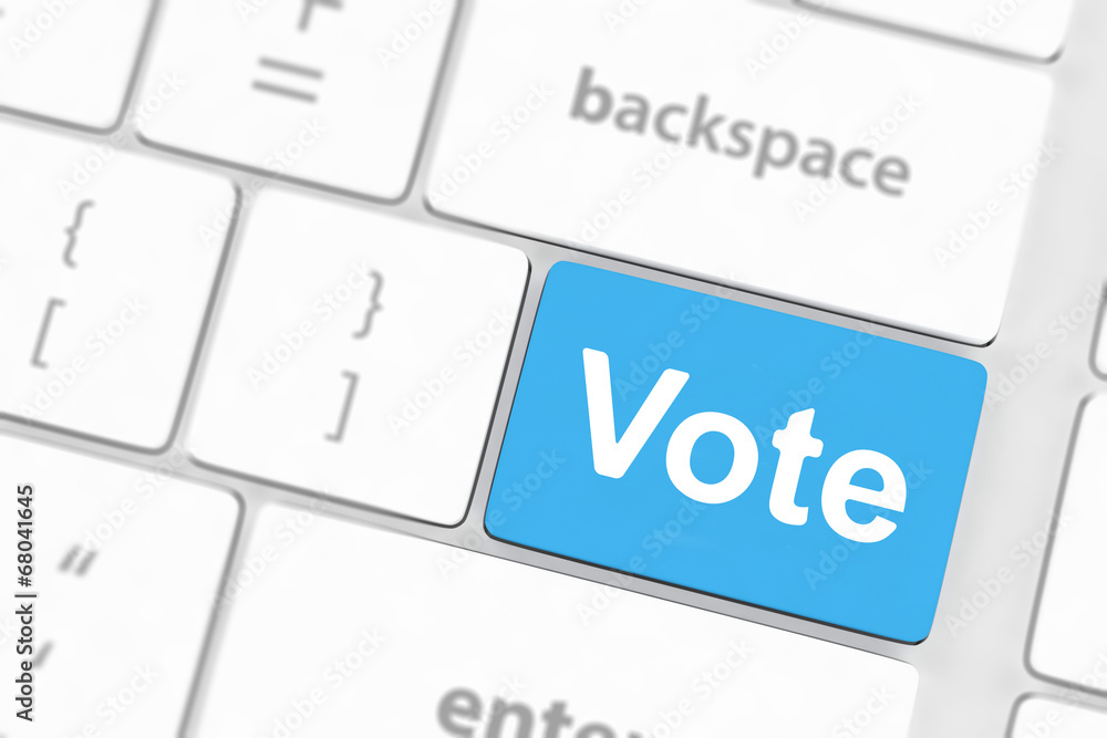 vote button on computer keyboard showing internet concept vote button on computer keyboard showing internet concept