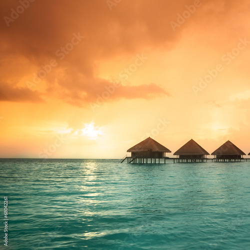 Over water bungalows with steps © fotomaximum