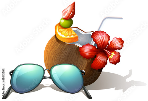 A refreshing drink and a sunglasses for a beach outing