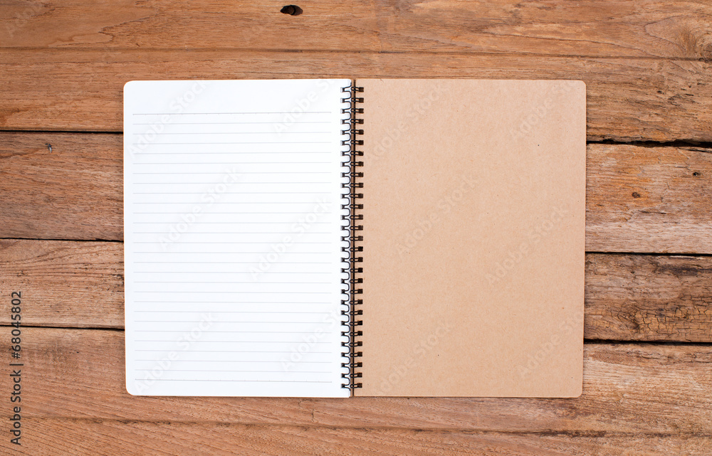 Blank notebook on old wood background Blank notebook on old wood background