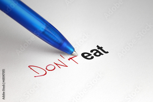 Don't eat. Written on white paper