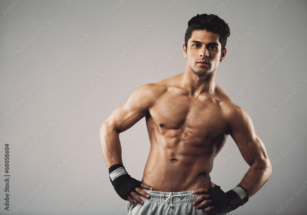 Attractive young man with muscular physique