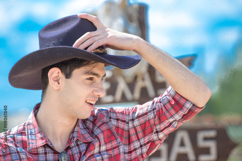 Fototapeta premium Cowboy on sign background.