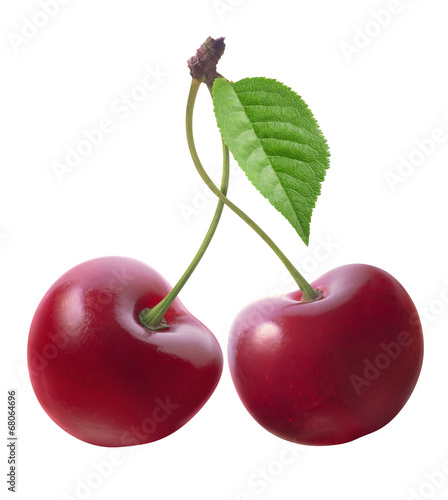 Two cherries and leaf isolated on white background