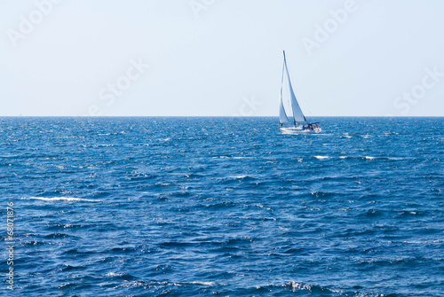 Sailing crew on sailboat © smile35