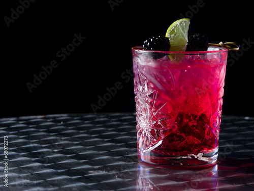 Fotografija Red cocktail in a whisky glass