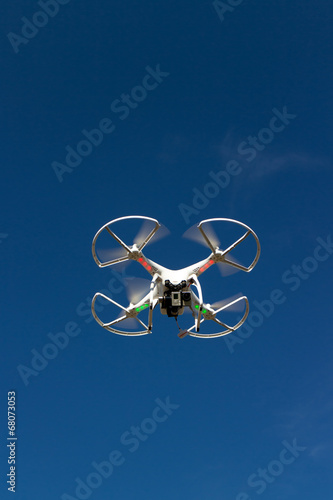 white drone with cam