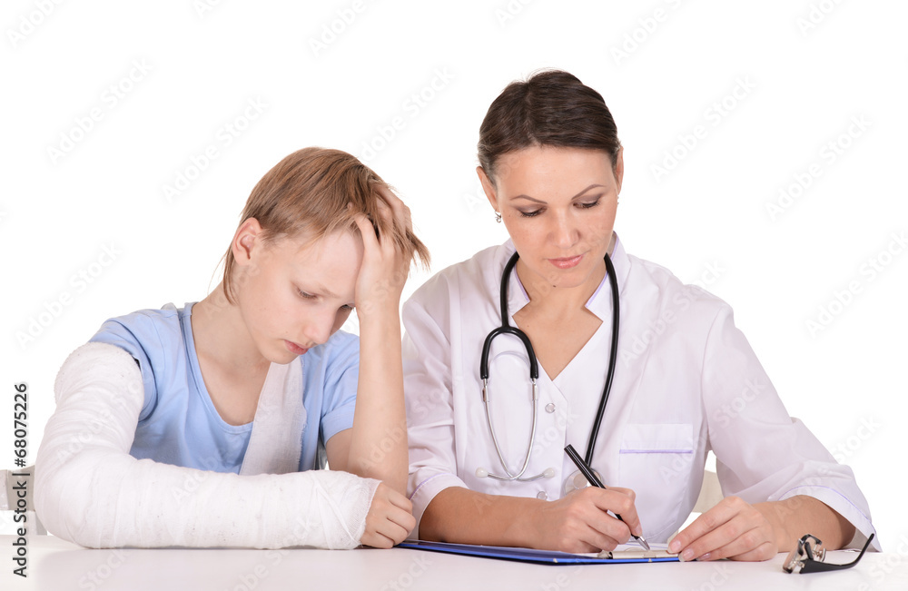 Female doctor and young boy