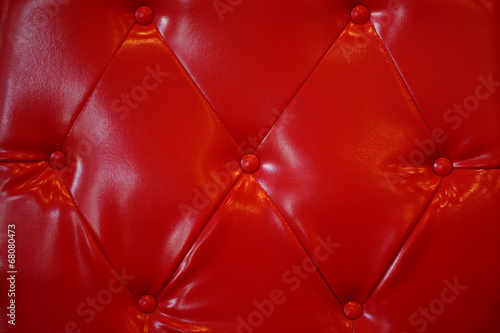 red bottoned on leather pattern photo