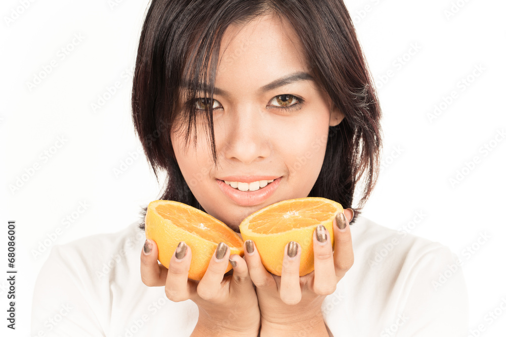 Young woman holding fresh oranges. Healthy eating. Isolated over Young woman holding fresh oranges. Healthy eating. Isolated over
