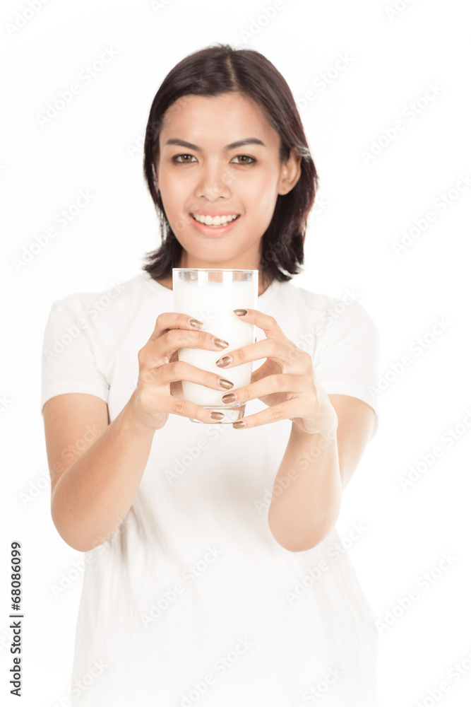 Laughing young woman with a glass of milk Laughing young woman with a glass of milk