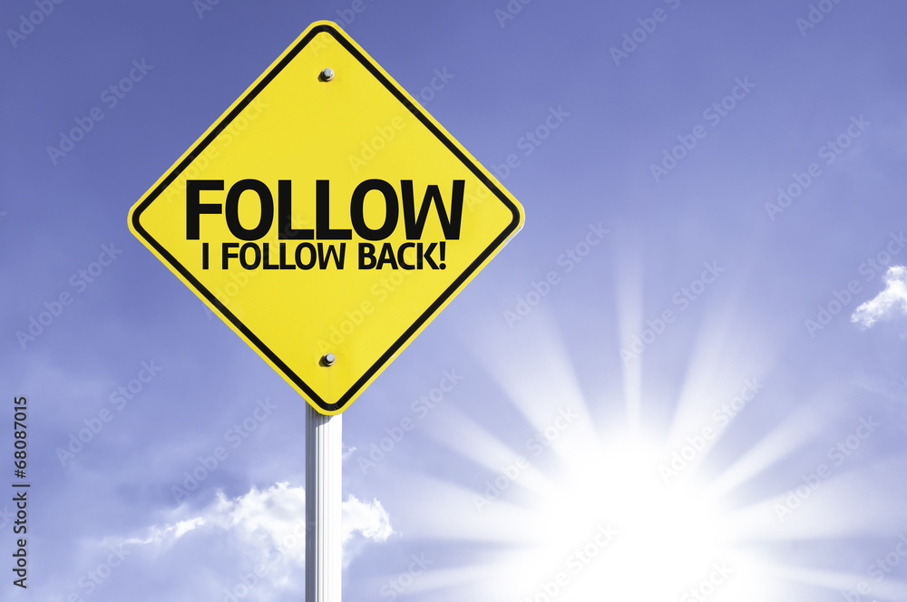 Follow, I Follow back road sign with sun background Follow, I Follow back road sign with sun background