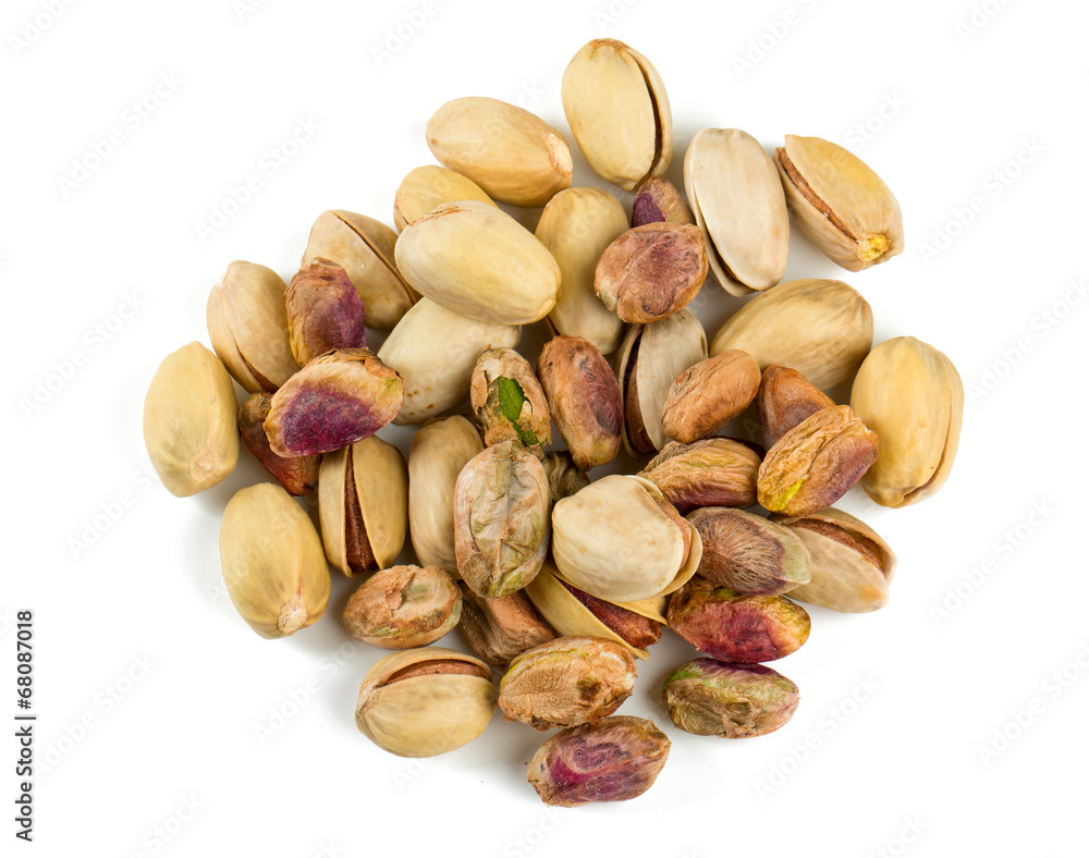heap of pistachio isolated on white