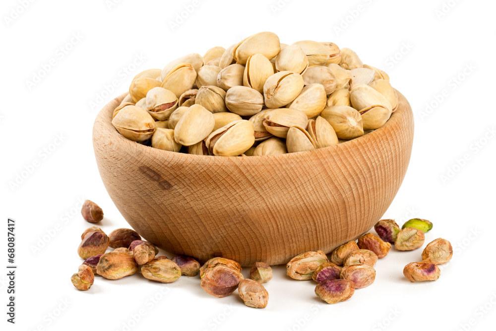 bowl of pistachio isolated on white bowl of pistachio isolated on white
