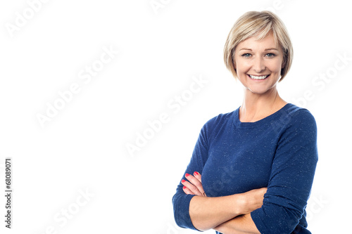 Cheerful woman posing confidently