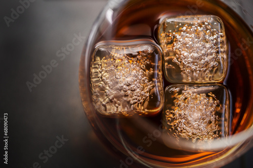 Dark Beverage in Glass with Ice from Above