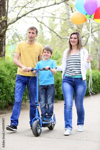 Happy family, walk in the park