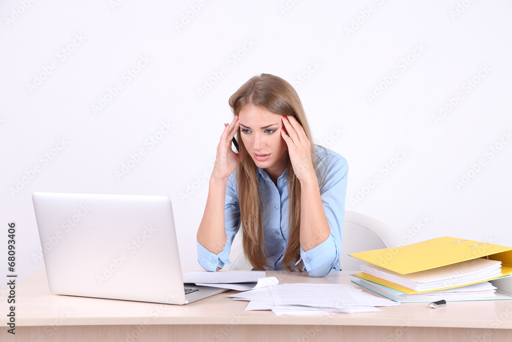 Business woman with documents at her workplace Business woman with documents at her workplace
