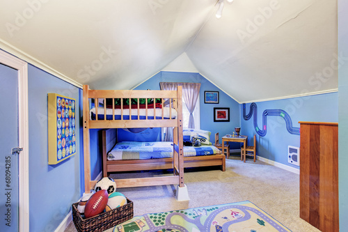 Photography Bright blue kids room with bunk bed