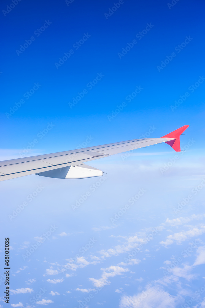 Looking through window aircraft during flight in wing with a nic Looking through window aircraft during flight in wing with a nic