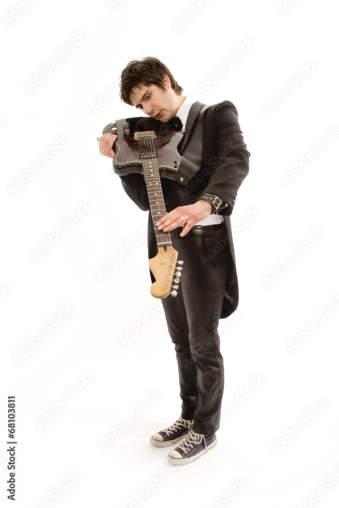 Naklejka premium guitarist in a tuxedo