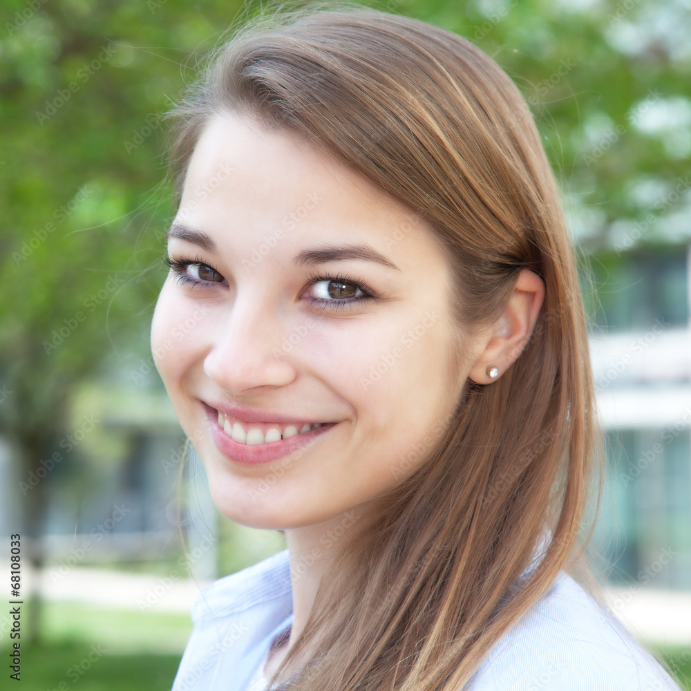 Attractive woman with blond hair looking at camera Attractive woman with blond hair looking at camera