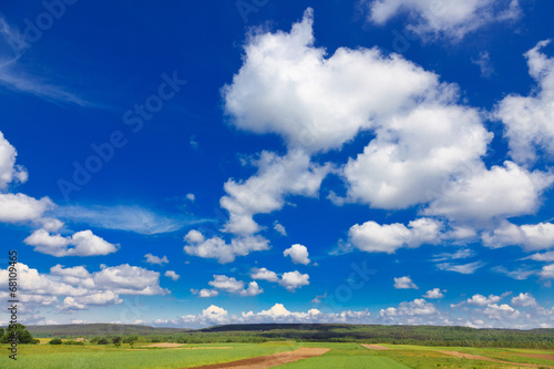 rural landscape with blue sky and clouds