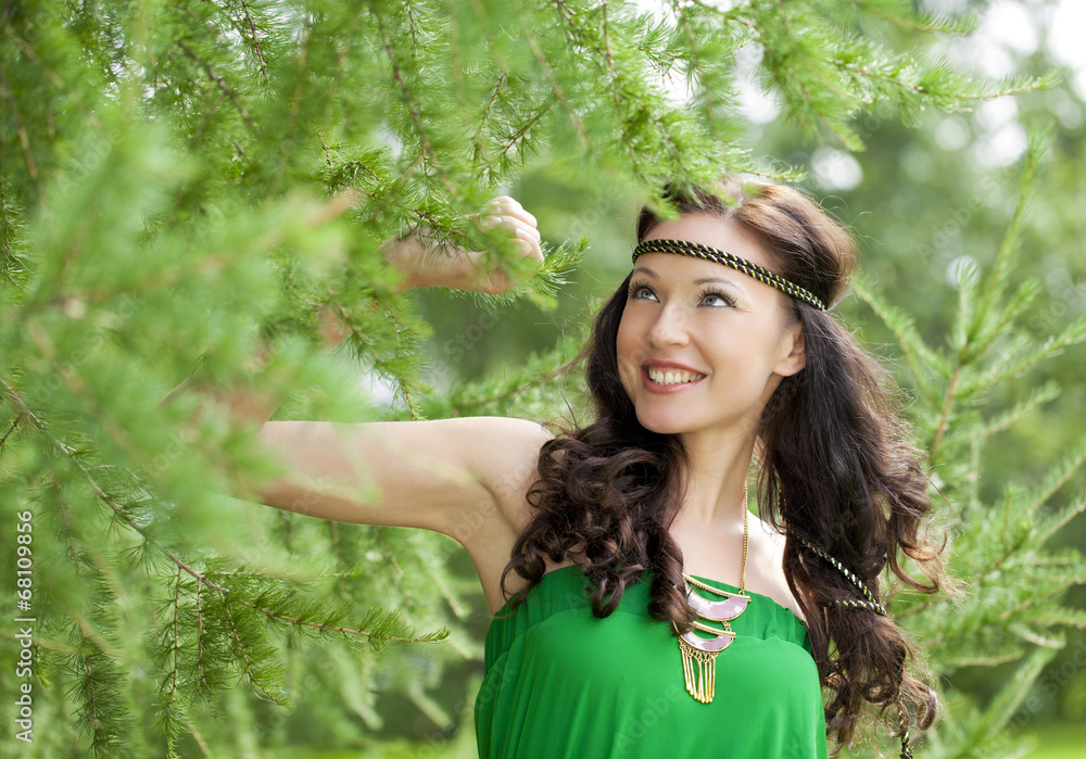 Beautiful young woman in green dress Beautiful young woman in green dress