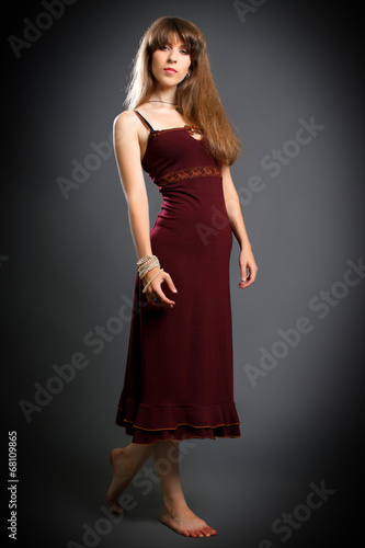 brunette in a red dress