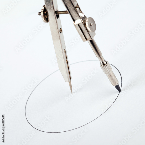 pair of compasses drawing circle