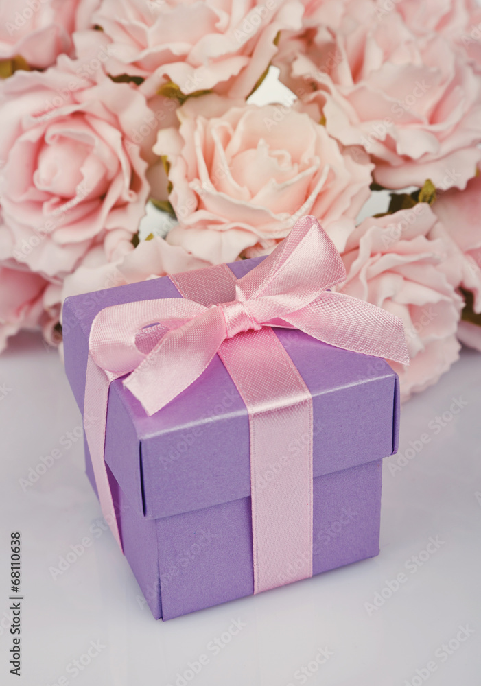 pink flowers and gift box pink flowers and gift box