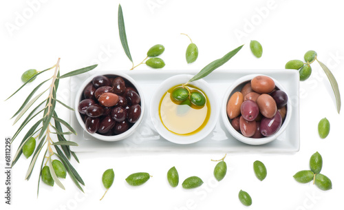 assortment of marinated olives and olive oil from above