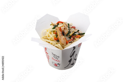 Japanese kuhnya.Lapsha udon with chicken, vegetables, almonds an