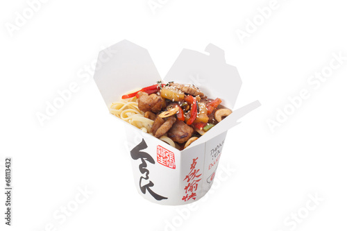 Japanese cuisine. Udon noodles with pork, vegetables and cashews