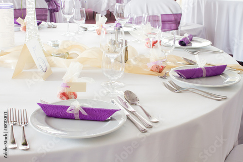 holiday table setting, purple napkin on plate - close up © ctvvelve