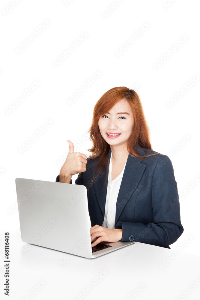 Asian office girl show thumbs up with notebook PC Asian office girl show thumbs up with notebook PC