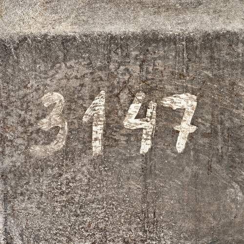 Metal texture background with painted number